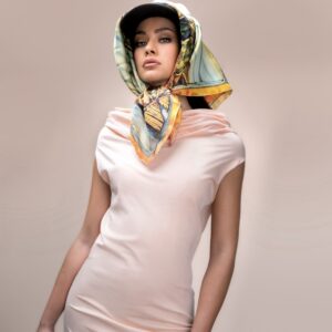 Miss Tahiti 2025 wearing the "Le souffle de Bora Bora" silk square tied on her head