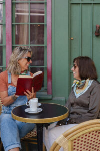 Luxury silk scarves worn in everyday shared moments